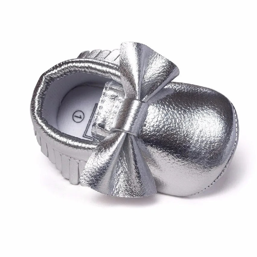 Eboo Shimmering Silver Bow Moccasins