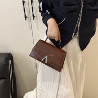 Eboo Structured Top-Handle Satchel with Signature Gold-Tone V-Hardware